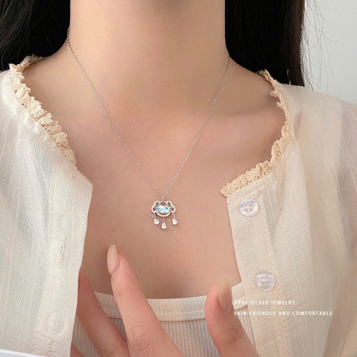 999 Fine Silver Iridescent Peace Lock Teardrop Tassel Necklace - Image 2