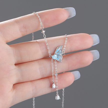 999 Fine Silver Glow-in-the-Dark Butterfly Heart Tassel Necklace - Image 3