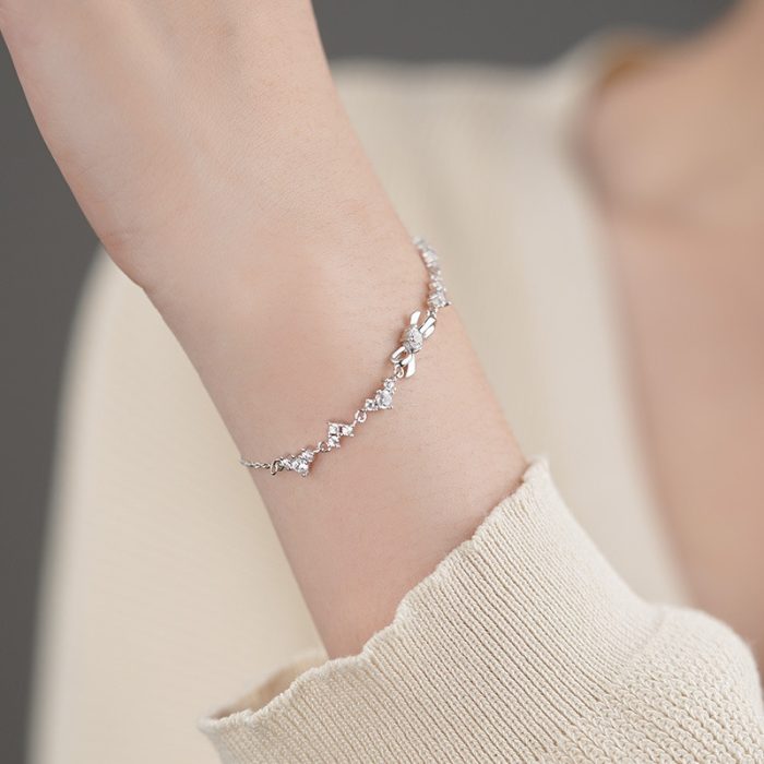 999 Fine Silver Bow CZ Heart Bracelet - Image 2