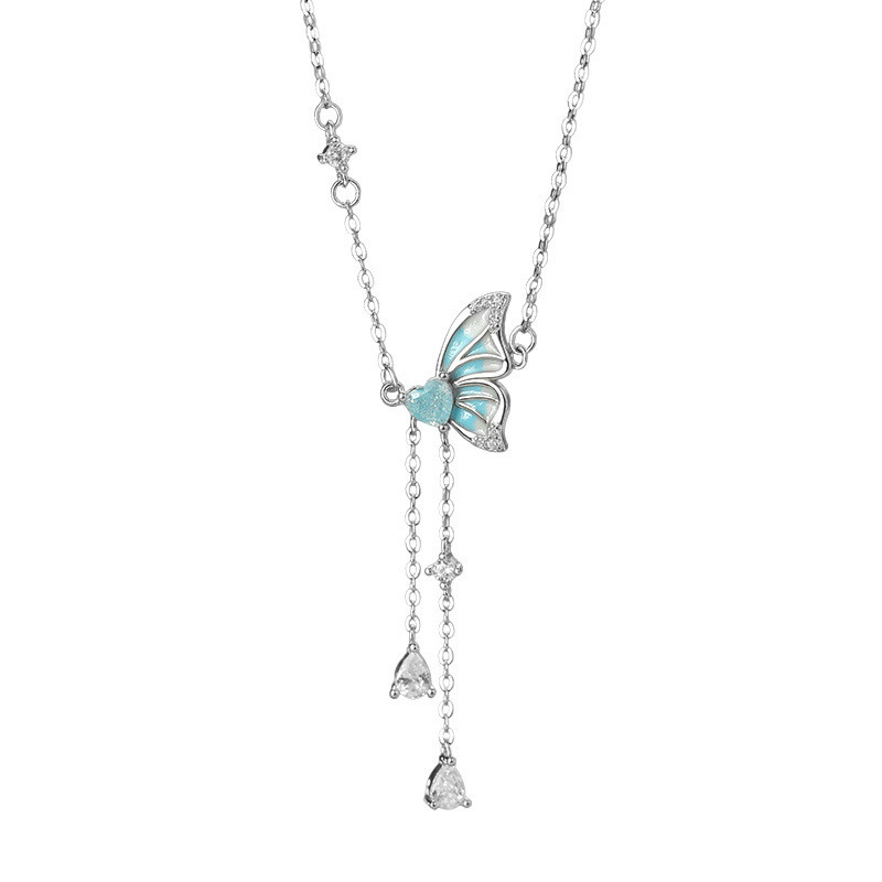 sg-11134201-825a3-ms4c9iiqhxxdb4 999 Fine Silver Glow-in-the-Dark Butterfly Heart Tassel Necklace - Image 1