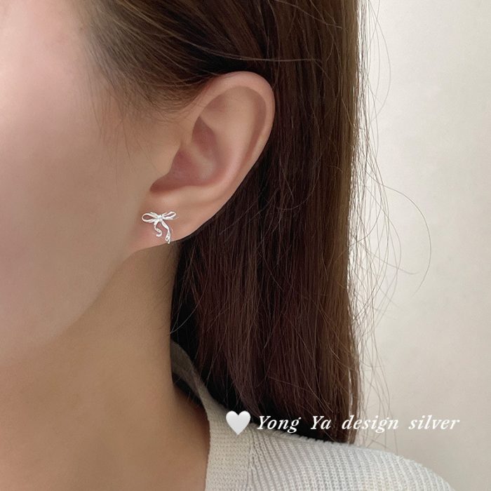 999 Fine Silver Minimalist Bow Stud Earrings - Image 2