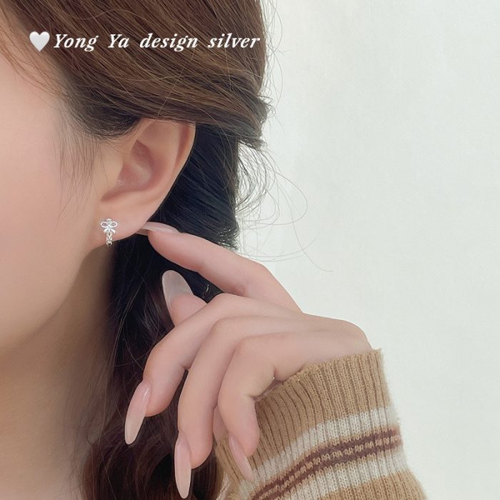 925 Sterling Silver Hollow Bow Hoop Earrings - Image 2