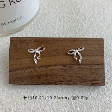999 Fine Silver Minimalist Bow Stud Earrings - Image 6
